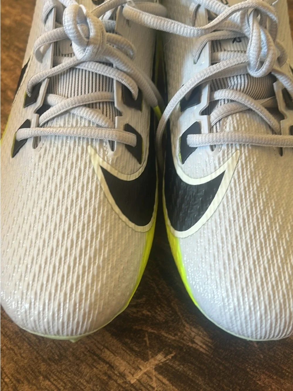 Nike Kids White and Neon Yellow Soccer Cleats with Black Swoosh